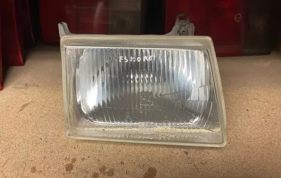 Ford Escort Headlight/headlamp 30212400