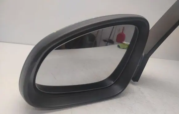 Opel Astra J Front door electric wing mirror 12L34
