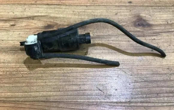 Renault Megane I Windscreen/windshield washer pump 7700821782