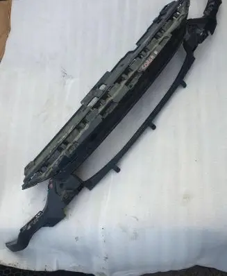 Engine bonnet/hood lock trim molding