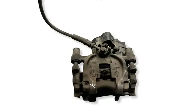 Volkswagen Golf VII Rear brake caliper 