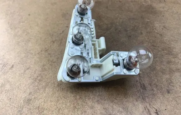 BMW 3 E90 E91 Tail light bulb cover holder 6937473 63216937473