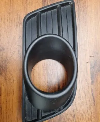 Suzuki Swift I Front fog light trim/grill 7175172K1R