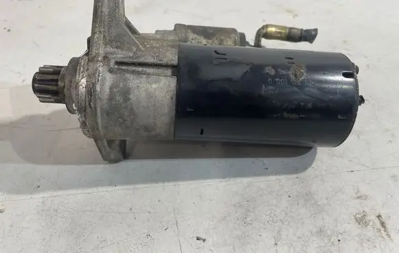 Volkswagen Golf V Starter motor 02E911023L 0001123036