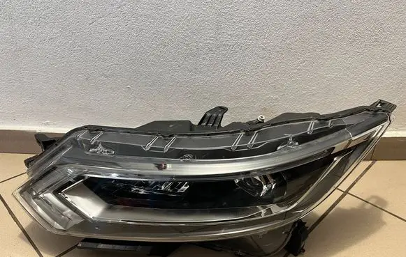 Nissan Qashqai Headlight/headlamp 10019011