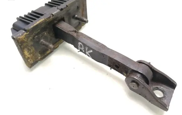 Front door check strap stopper
