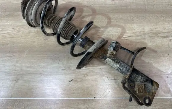Renault Laguna II Front shock absorber with coil spring