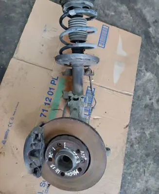 Renault Megane III Front shock absorber with coil spring