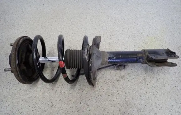 Mitsubishi Outlander Front shock absorber with coil spring 
