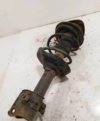 Subaru Legacy Front shock absorber with coil spring