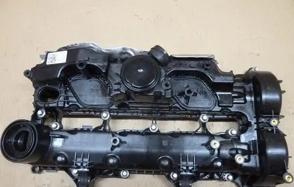 Rocker cam cover