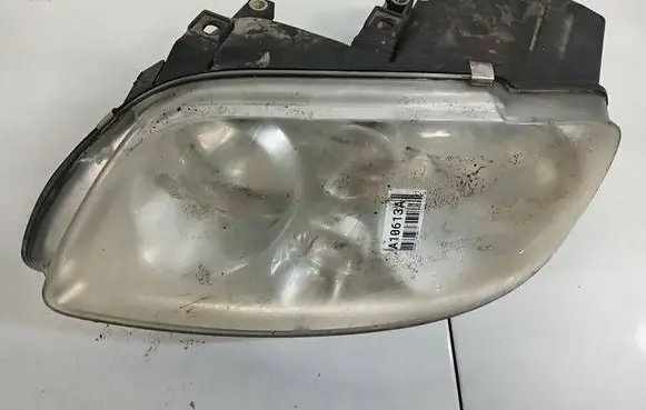 Volkswagen Touran I Headlight/headlamp 01930843