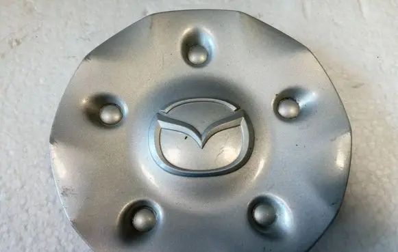 Mazda Demio Original wheel cap B25G37190 NE70137