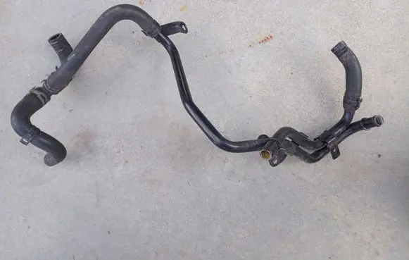 Skoda Octavia Mk2 (1Z) Engine coolant pipe/hose 03C121070L 1K0122063K