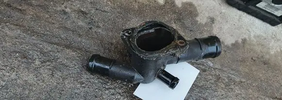 Thermostat/thermostat housing
