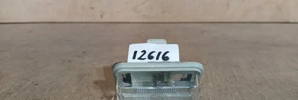 Toyota Avensis T250 Number plate light L001479 HELLA0555 001479