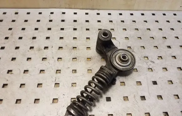 Opel Corsa D Generator/alternator belt tensioner 55565236