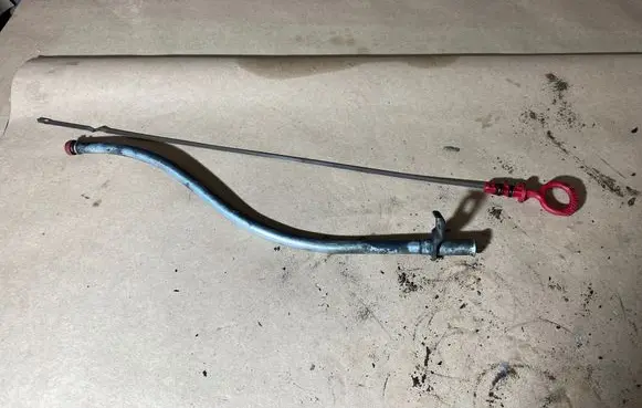 Oil level dip stick
