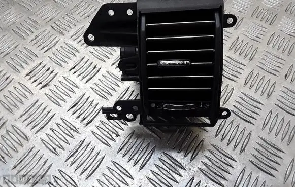 Jaguar XF Dash center air vent grill DRS6615Z03