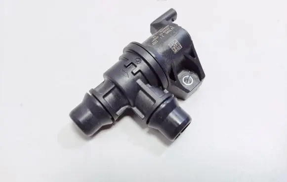 Coolant heater control valve