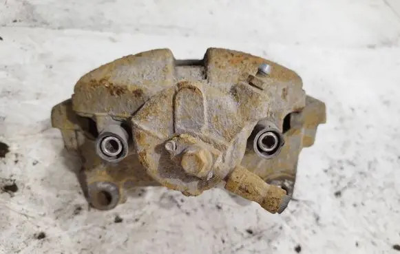Volkswagen Golf VI Front brake caliper