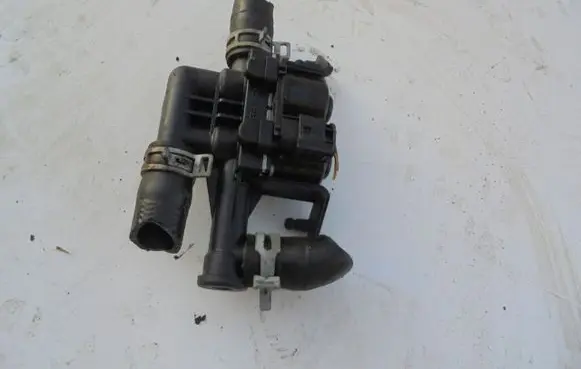 Coolant heater control valve