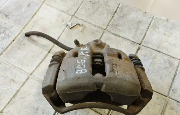 Mitsubishi Colt Front brake caliper