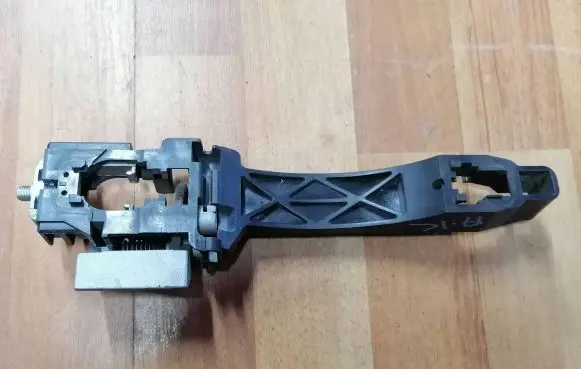 Rear door exterior handle/bracket