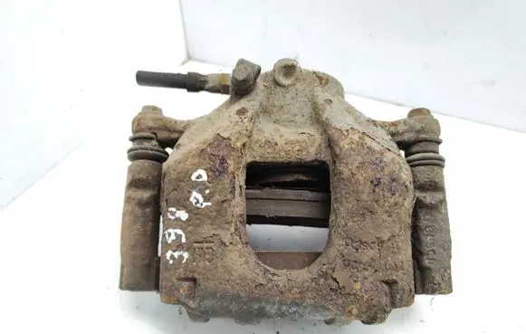Opel Corsa D Front brake caliper 