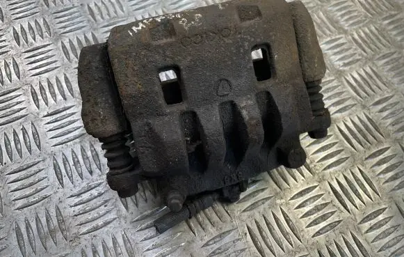 Subaru Impreza III Front brake caliper