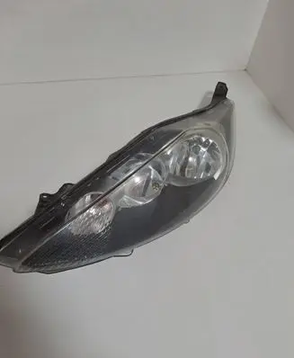 Ford Fiesta Headlight/headlamp 8A6113W030AF 1EJ24704501