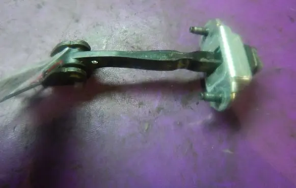 Ford Fiesta Front door check strap stopper