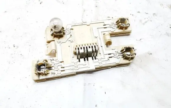 Renault Clio I Tail light bulb cover holder
