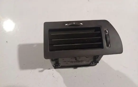 Dash center air vent grill