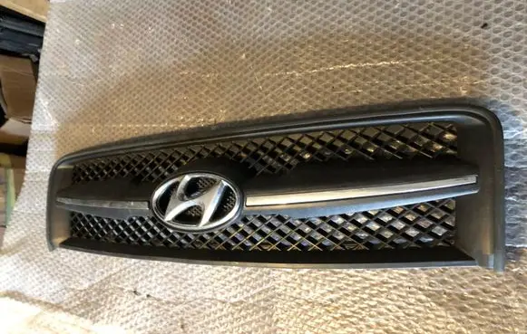Hyundai Tucson JM Front bumper upper radiator grill