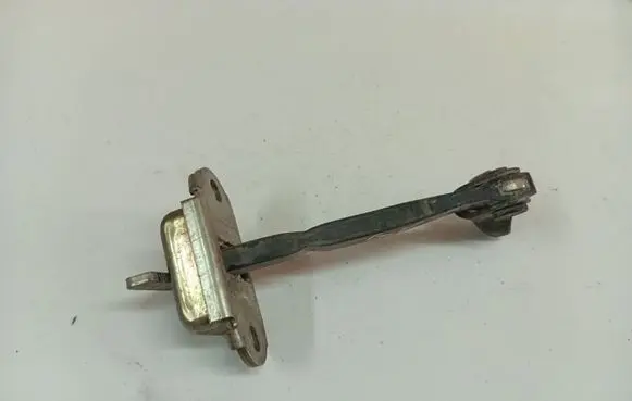 Toyota Yaris Rear door check strap stopper