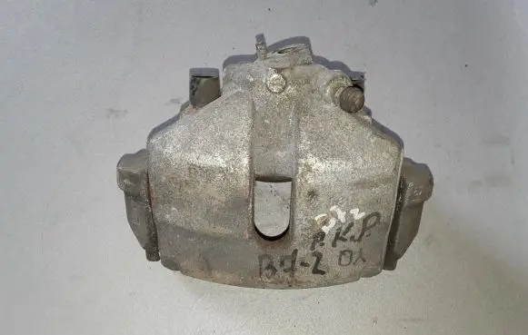 Volkswagen PASSAT B7 Front brake caliper 1K0615123E