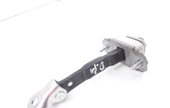 Front door check strap stopper
