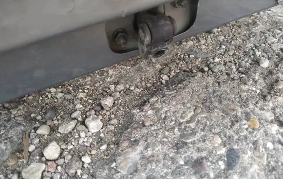 Front door check strap stopper