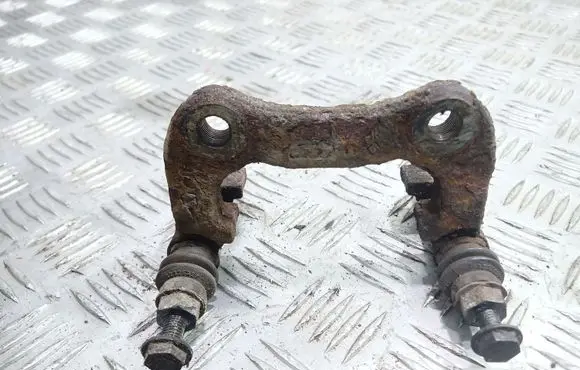 Renault Scenic I Brake caliper pad carrier rear 