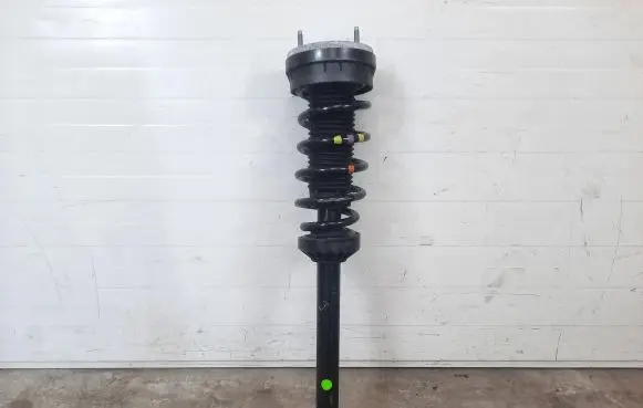 Jaguar XE Front shock absorber with coil spring