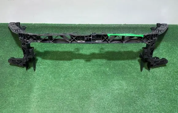 Radiator support slam panel
