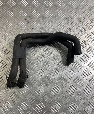 Volkswagen Touareg II Engine coolant pipe/hose 7L0122073AC