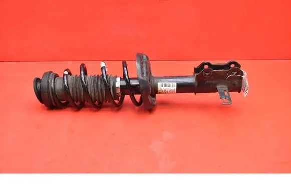 Opel Astra J Front shock absorber/damper 13474015