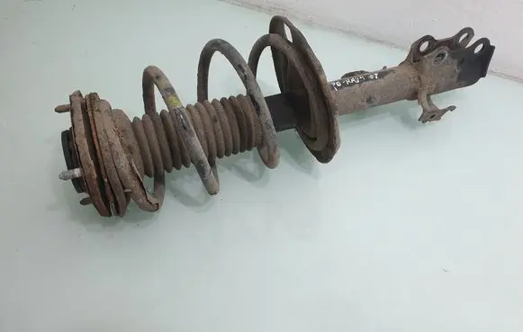 Front shock absorber with coil spring