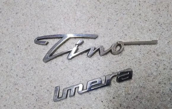Nissan Almera Tino Manufacturers badge/model letters 90895BU300