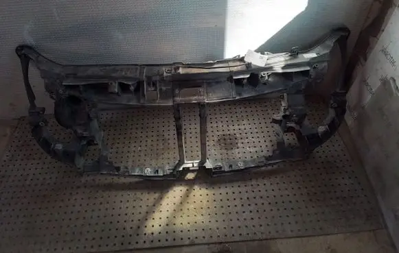 Radiator support slam panel