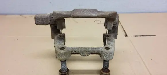 Volkswagen Caddy Brake caliper pad carrier rear 