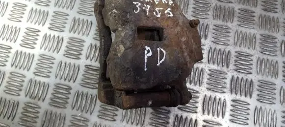 Nissan Almera N16 Front brake caliper