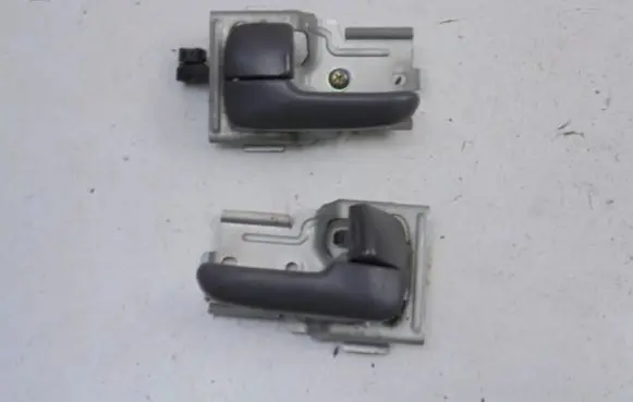 Mazda 323 F Front door interior handle MDH20JC21